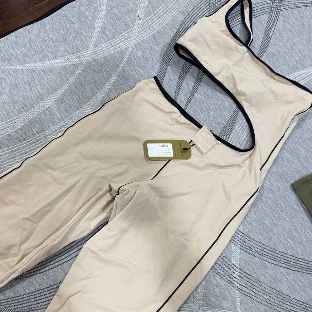 Elegant Beige Jumpsuit with Black Accents